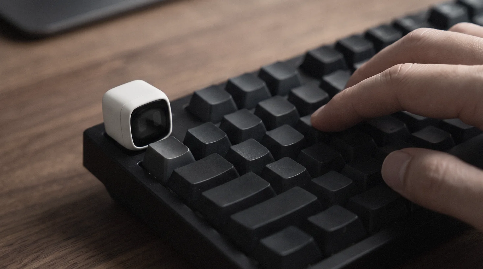 The keycap body on a keyboard as a hand types